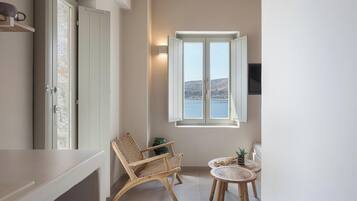 Superior Room | Living area | 43-inch Smart TV with cable channels