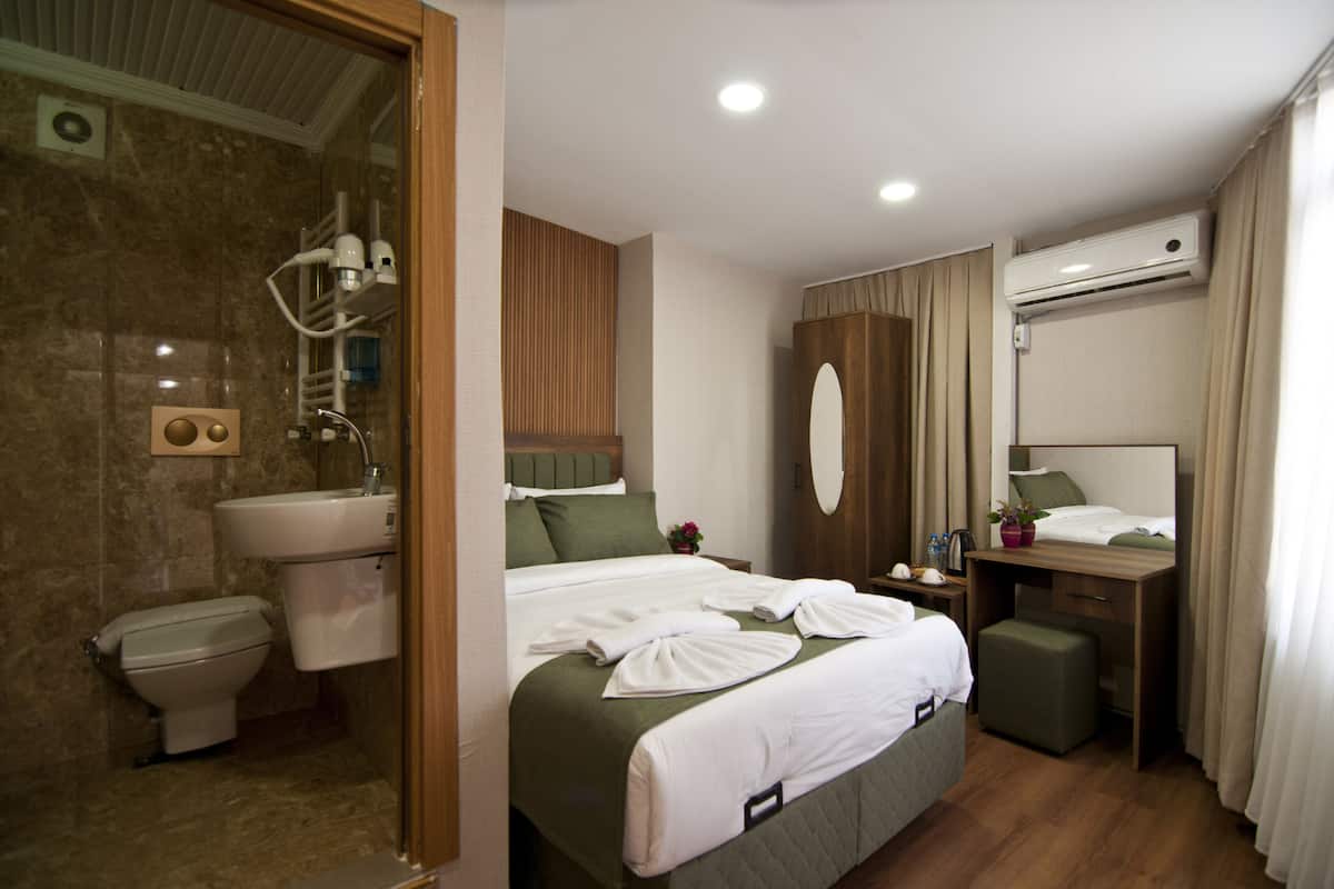 1 bedroom, hypo-allergenic bedding, down duvets, minibar
