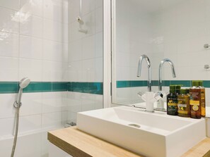 Hair dryer, towels, soap, shampoo