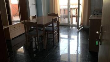 Apartment (Apartments Ata - Two Bedroom Apartmen) | Living room | 32-inch flat-screen TV with satellite channels