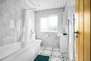 Shower, hair dryer, towels
