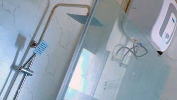 Separate tub and shower, free toiletries, bathrobes, slippers