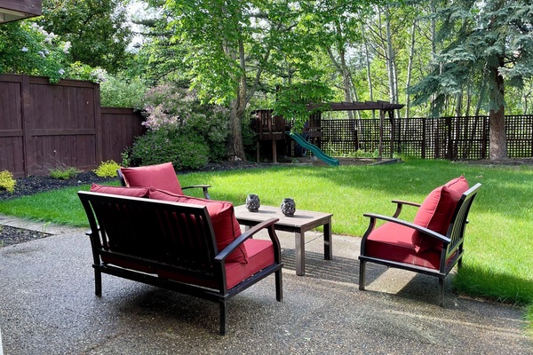 Large backyard with a play structure