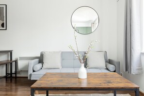 Deluxe Apartment, 1 Bedroom, Private Bathroom | Living area | Flat-screen TV