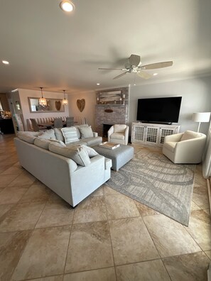 Smart TV, fireplace, books