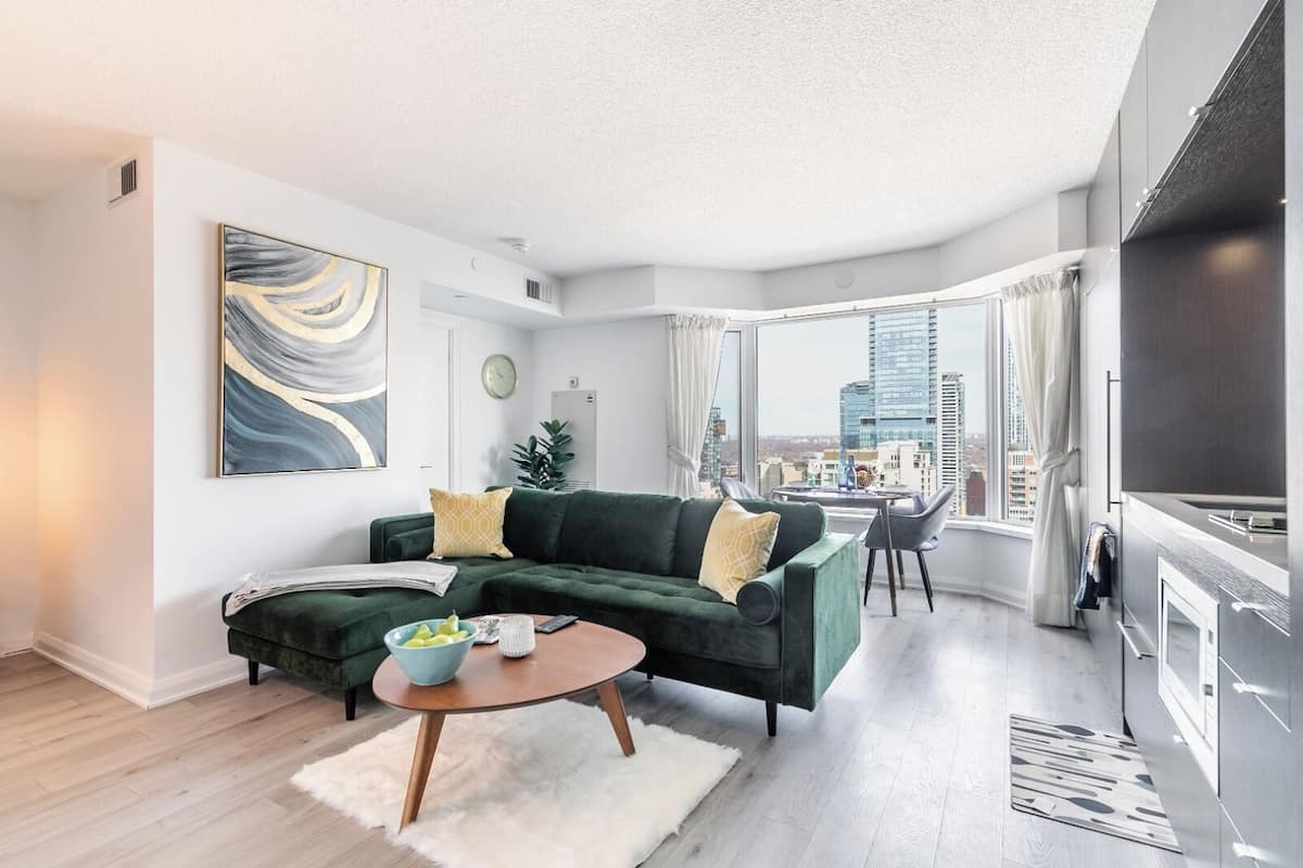 Economy, City View | Living area | 55-inch flat-screen TV with cable channels