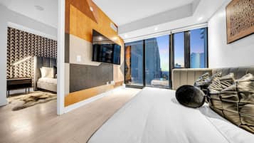 Premier Suite | Living room | 55-inch flat-screen TV with cable channels