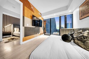 Suite Premier | Sala d'estar | Televisor de pantalla plana de 55 polzades amb canals per cable 