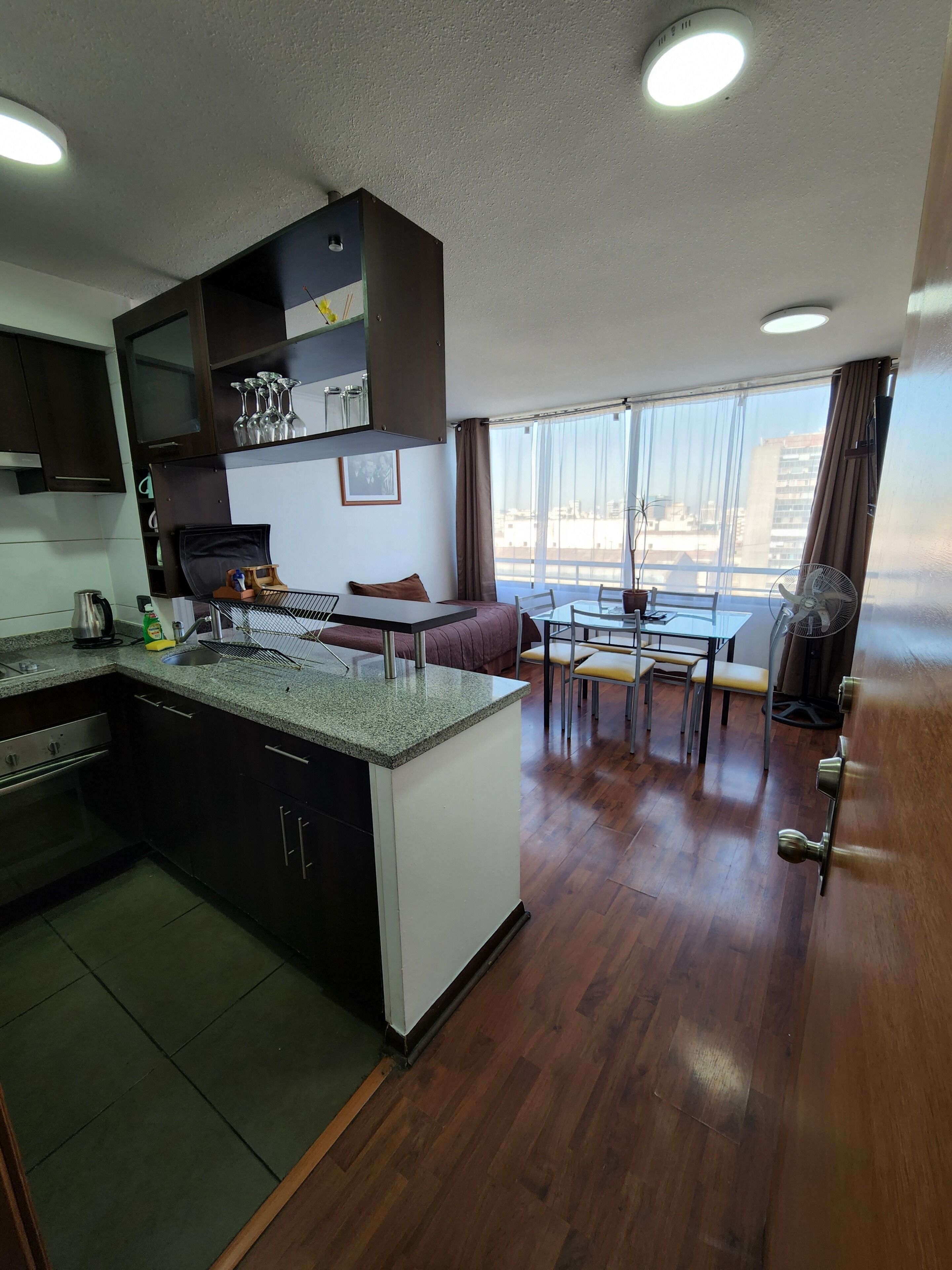 Family Apartment, City View | Private kitchen | Griddle, cookware/dishes/utensils, dining tables