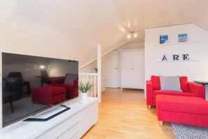 Lägenhet Deluxe | Vardagsrum | Platt-tv