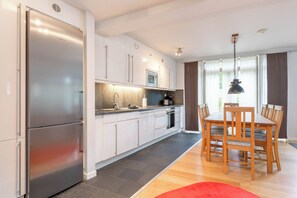 Family Apartment, Mountain View | Private kitchen | Electric kettle, toaster, high chair