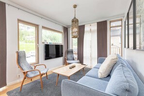 Family Apartment, Mountain View | Living area | Flat-screen TV