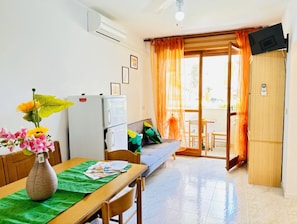 Apartment, 1 Bedroom, Balcony, City View | Living room