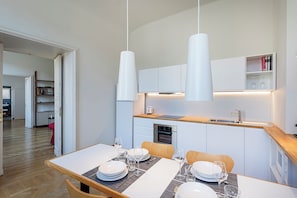Appartement | Cuisine privée | Chaise haute