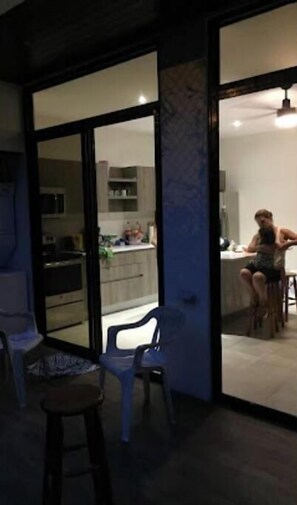 Enjoy meals and work sessions in this well-designed room with a separate kitchen area.