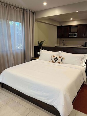 1 bedroom, desk, iron/ironing board, travel cot