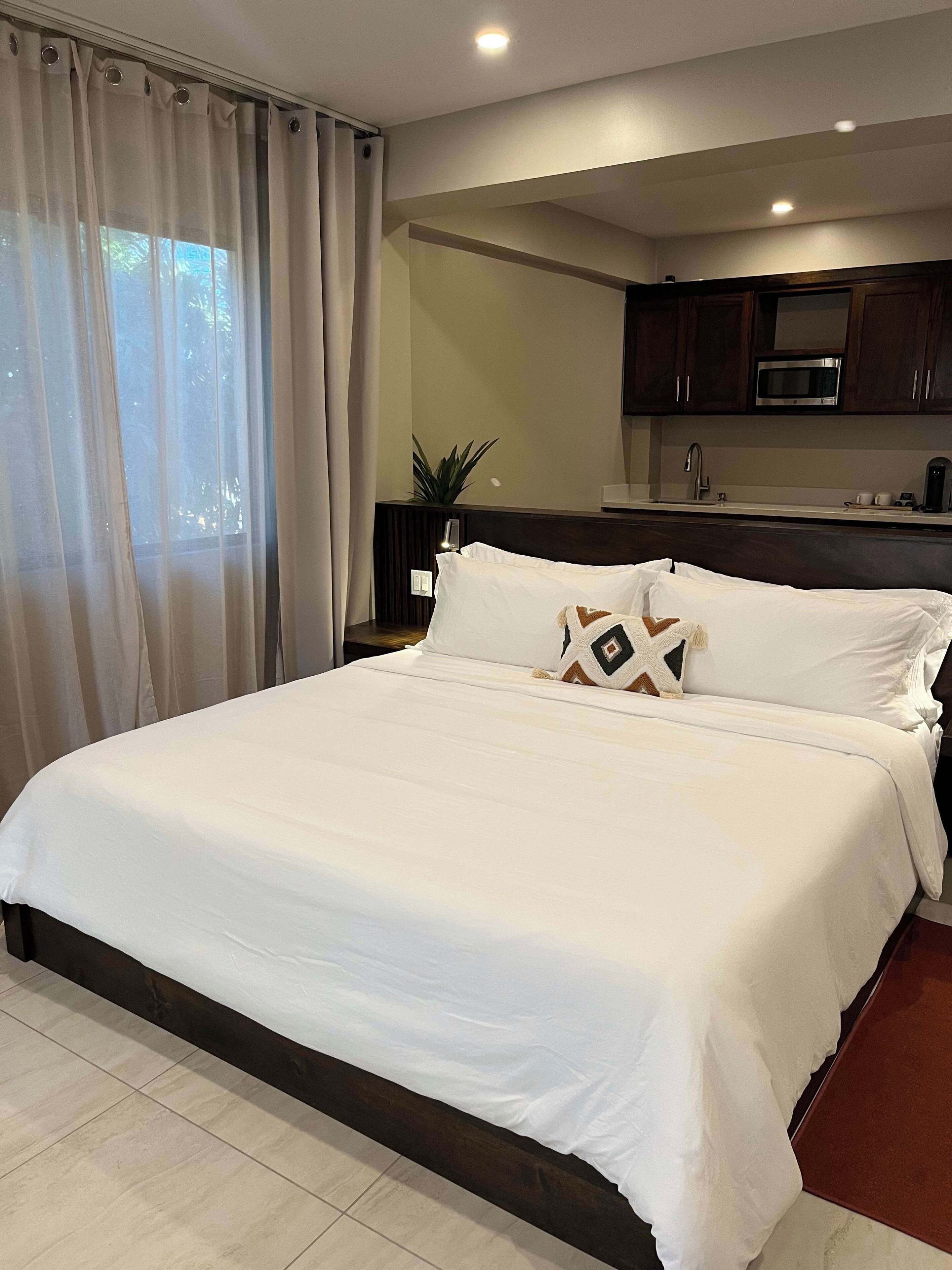 1 bedroom, desk, iron/ironing board, travel crib