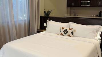 1 bedroom, desk, iron/ironing board, travel crib