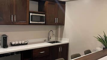 Fridge, microwave, coffee/tea maker, toaster