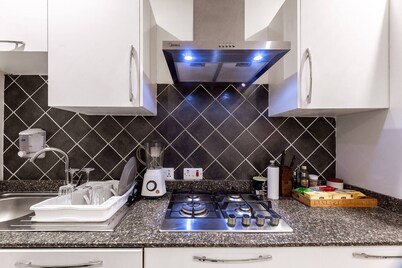 Cozy 2-bedroom townhome with AC and WiFi in brilliant Adenta