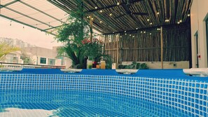 Outdoor pool, pool umbrellas - UNIQUE Creative Apartment w SKY View (Hanoi)