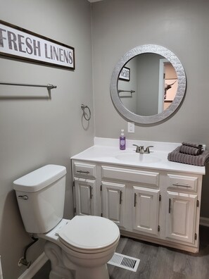 Hair dryer, towels, soap, shampoo