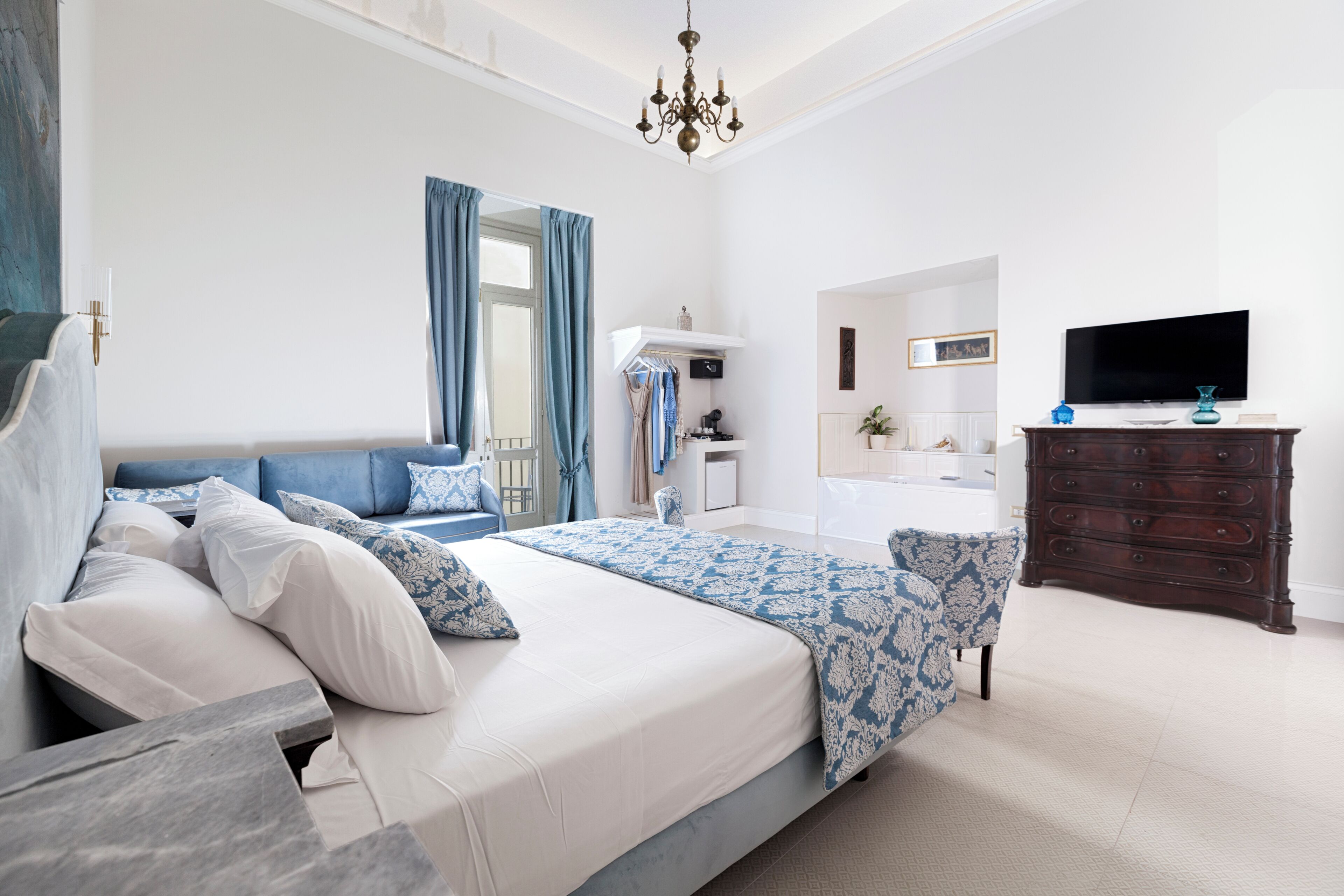 Premium bedding, down duvets, Select Comfort beds, free minibar