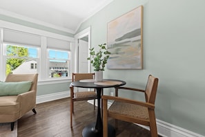 Thoughtfully placed within the open living area, this dining nook seamlessly integrates with the surrounding environment, fostering a harmonious flow and a cohesive aesthetic throughout your home. - New! Cozy 2BR near Lake at Anchor Bay (New Baltimore,)
