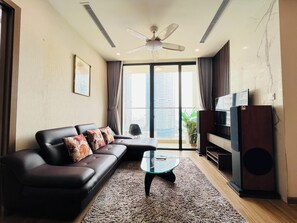Luxury Apartment, 2 Bedrooms, City View | Living area | 55-inch Smart TV with digital channels, pay movies - LT.Housing Vinhomes Skylake (Hanoi)