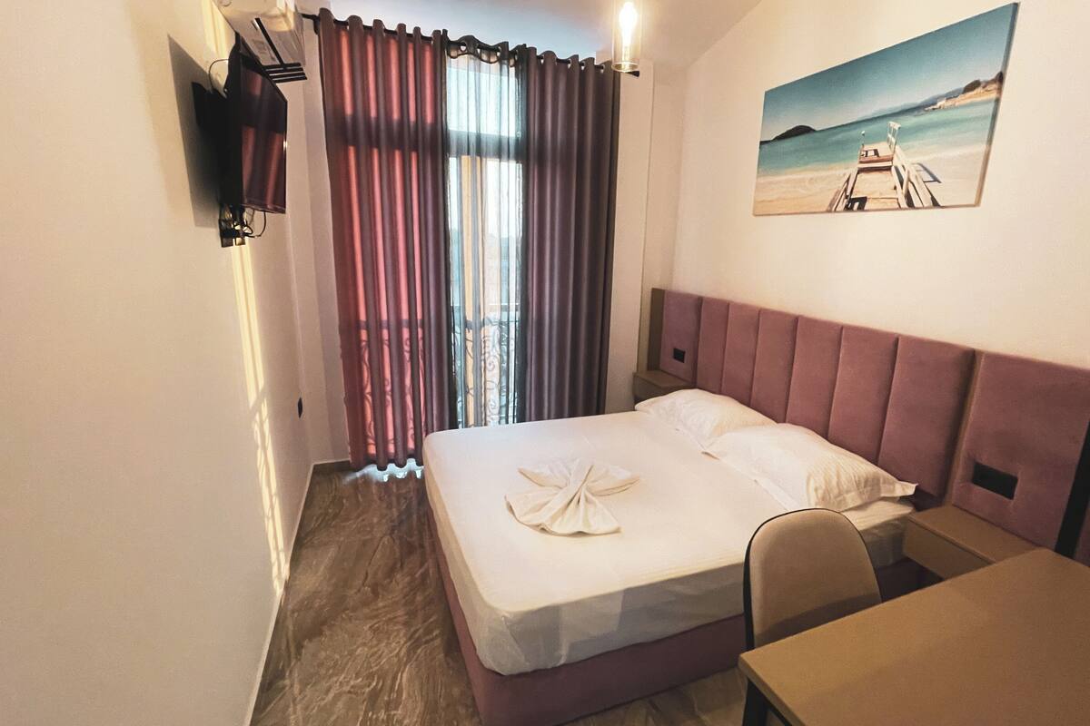 Design Room, Balcony, Pool View | 1 bedroom, desk, laptop workspace, free WiFi