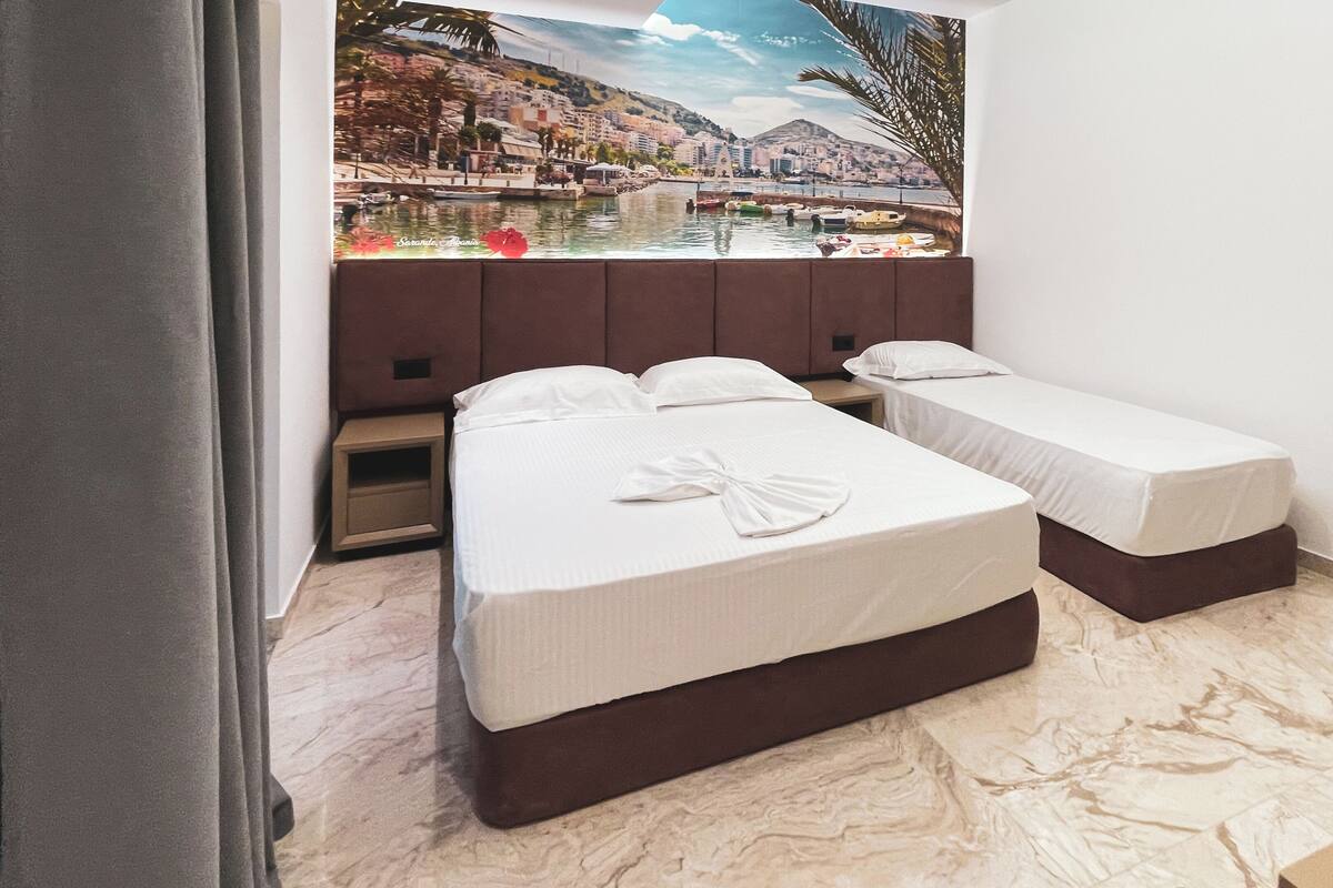 Room, Balcony, Pool View | 1 bedroom, desk, laptop workspace, free WiFi