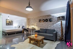 Superior Suite, Balcony, Courtyard View | In-room safe, individually decorated, desk, blackout drapes