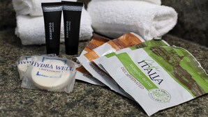 Toiletries including Hydra Well body and facial soap, and a bag of Itália morning blend decaffeinated coffee. - Express Inn  (Durant)