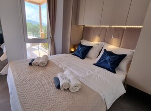 2 dormitorios, tabla de planchar con plancha, wifi y ropa de cama