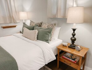 1 bedroom, desk, iron/ironing board, travel cot