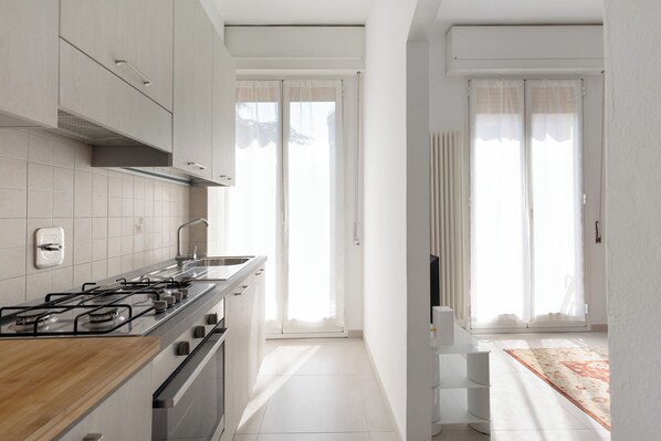 Apartment | Private kitchen | Dining tables