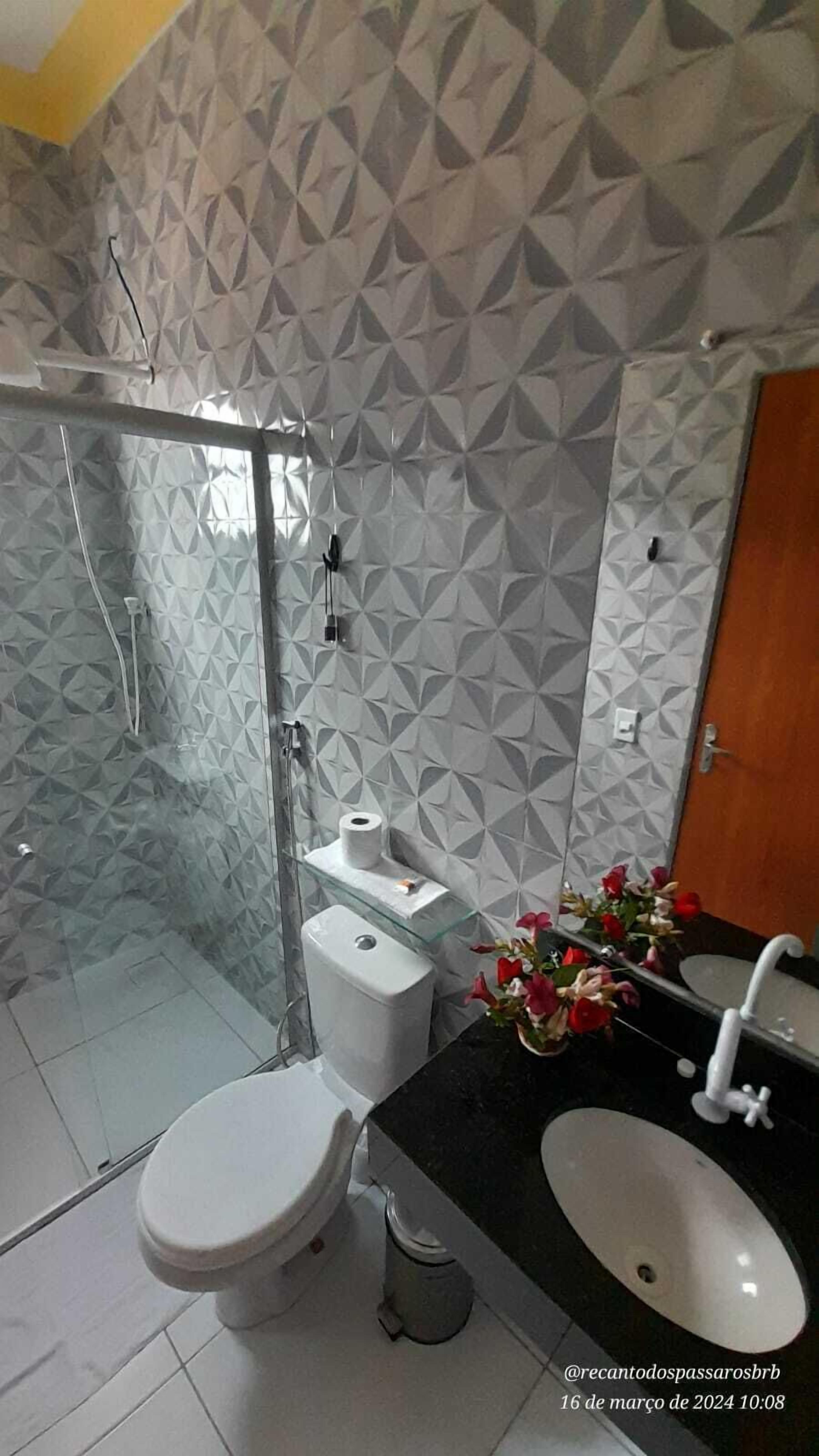 Shower, towels, soap, toilet paper