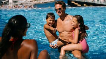 Indoor pool, outdoor pool, pool umbrellas, pool loungers