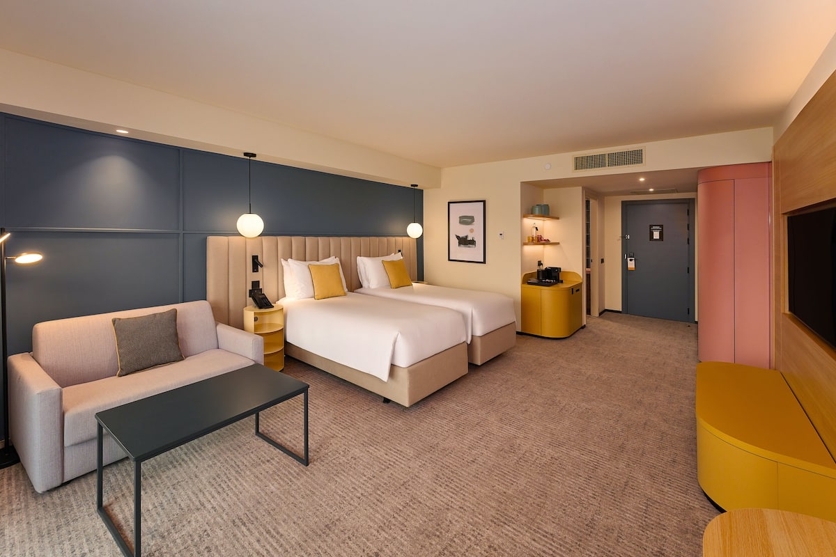 Premium Twin Room, Balcony, City View | Minibar, in-room safe, desk, laptop workspace