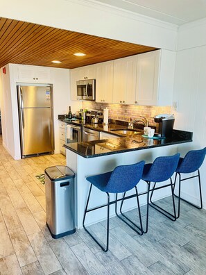 Fridge, microwave, oven, stovetop - Spacious ocean front 1 bedroom condo sleeps 6, located in mid town Ocean City (Ocean City)