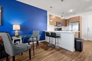 Enjoy meals in the kitchen with a central island and dining area.