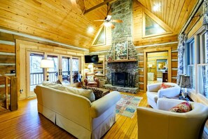 Téléviseur, foyer, lecteur de DVD, livres