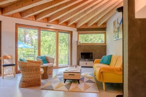 Ferienhaus 'Charmante Maison En Bois' mit privater Terrasse, privatem Garten und WLAN