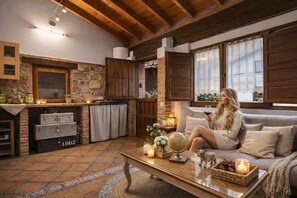 TV, fireplace - Country House 'El Carbayu, Hot Tub & Mountain Views' with Terrace and Wi-Fi (Proaza)