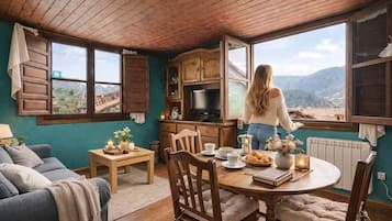 Televisión, chimenea, mesa de ping pong