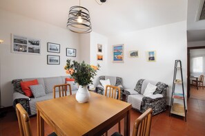 Apartment | Living area | TV - Casa di Titti by Wonderful Italy (Olbia)