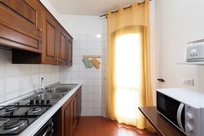 Apartment | Private kitchen | Fridge, oven, stovetop, dishwasher