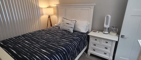 1 bedroom, desk, iron/ironing board, travel cot