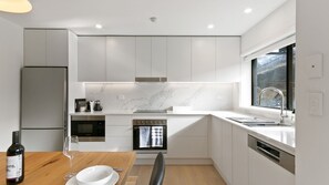 Microwave, oven, stovetop, dishwasher - Mowamba B4 three bedroom apartment (Thredbo)