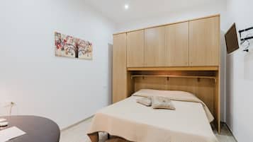 1 dormitorio, tabla de planchar con plancha, wifi gratis y ropa de cama